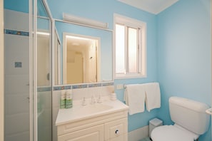 Shower, hair dryer, towels, soap