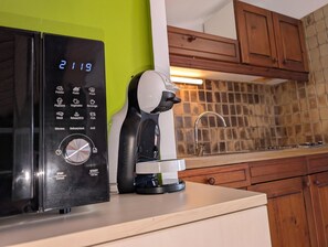 Fridge, microwave, coffee/tea maker, toaster