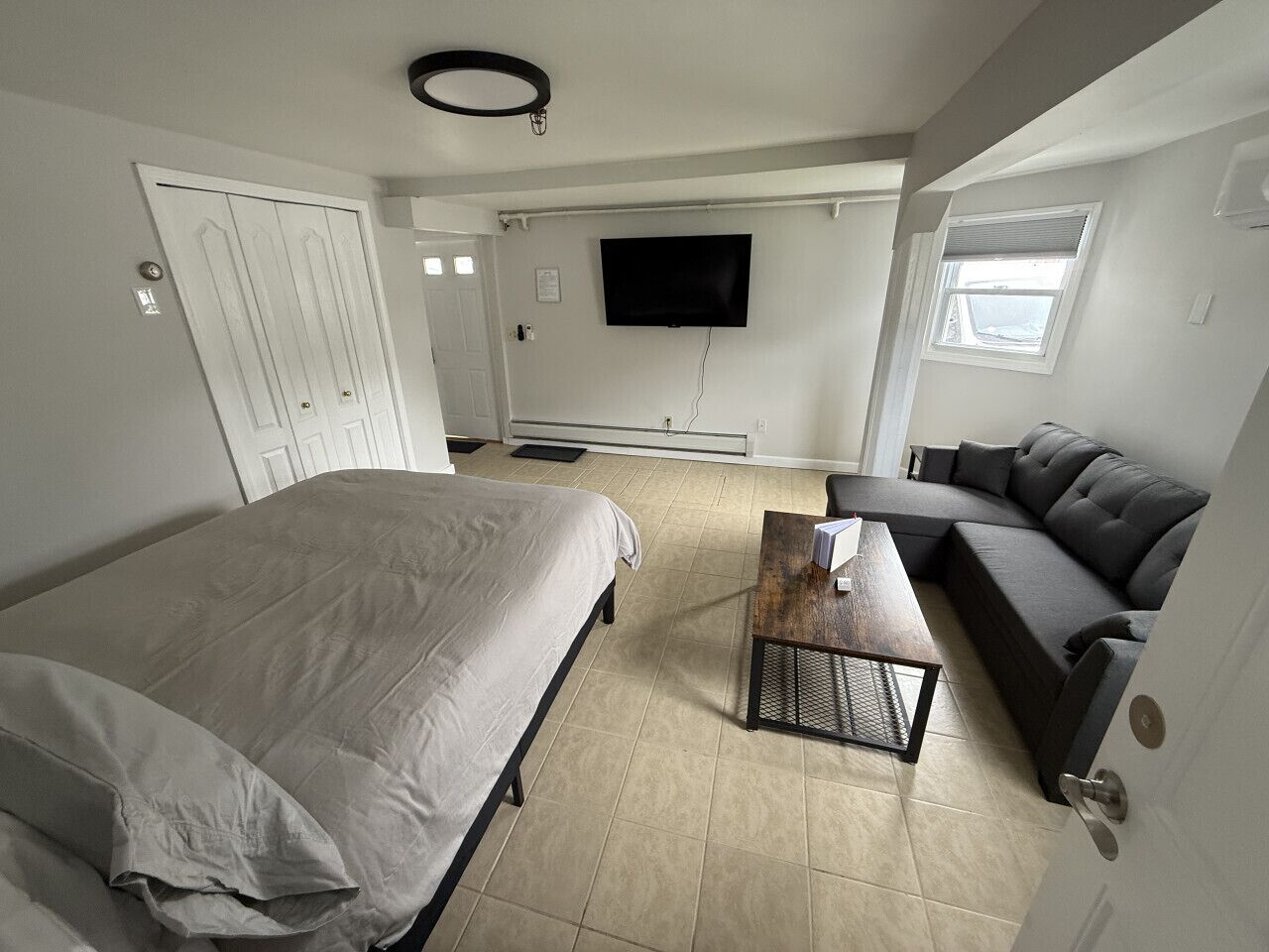 1 bedroom, desk, iron/ironing board, travel crib