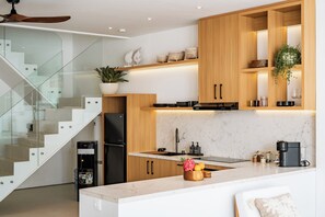 Junior Villa, Patio, Pool View | Private kitchen