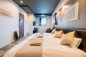 A hotel room with a long bed, a desk, a chair, and a television. - 201 Hotel within walking distance of Asakusa/Ueno/Akihabara, downtown sightseeing/Skytree (台東区)
