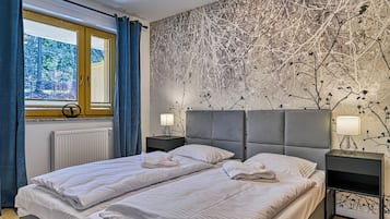 Apartemen (25C) | Kamar mandi | Shower dan handuk
