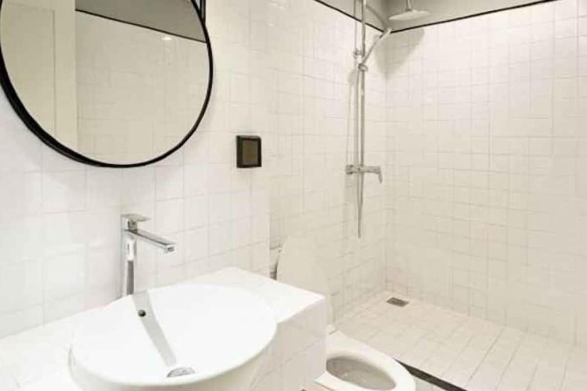 Bathroom | Shower, hair dryer, bathrobes, slippers