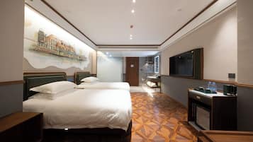Free minibar, individually decorated, desk, laptop workspace