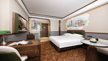 Habitación doble ejecutiva | Artículos del minibar gratis, decoración personalizada y escritorio