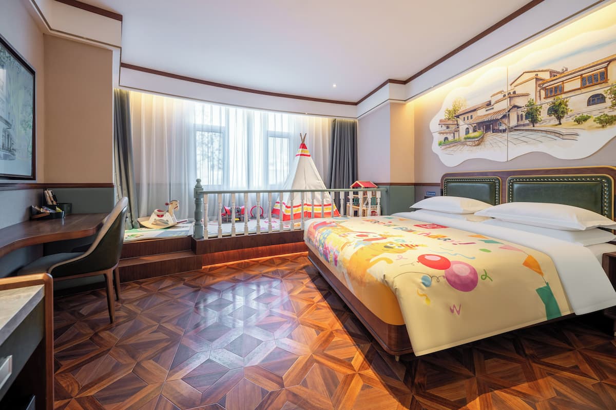 Family Room | Free minibar, individually decorated, desk, laptop workspace