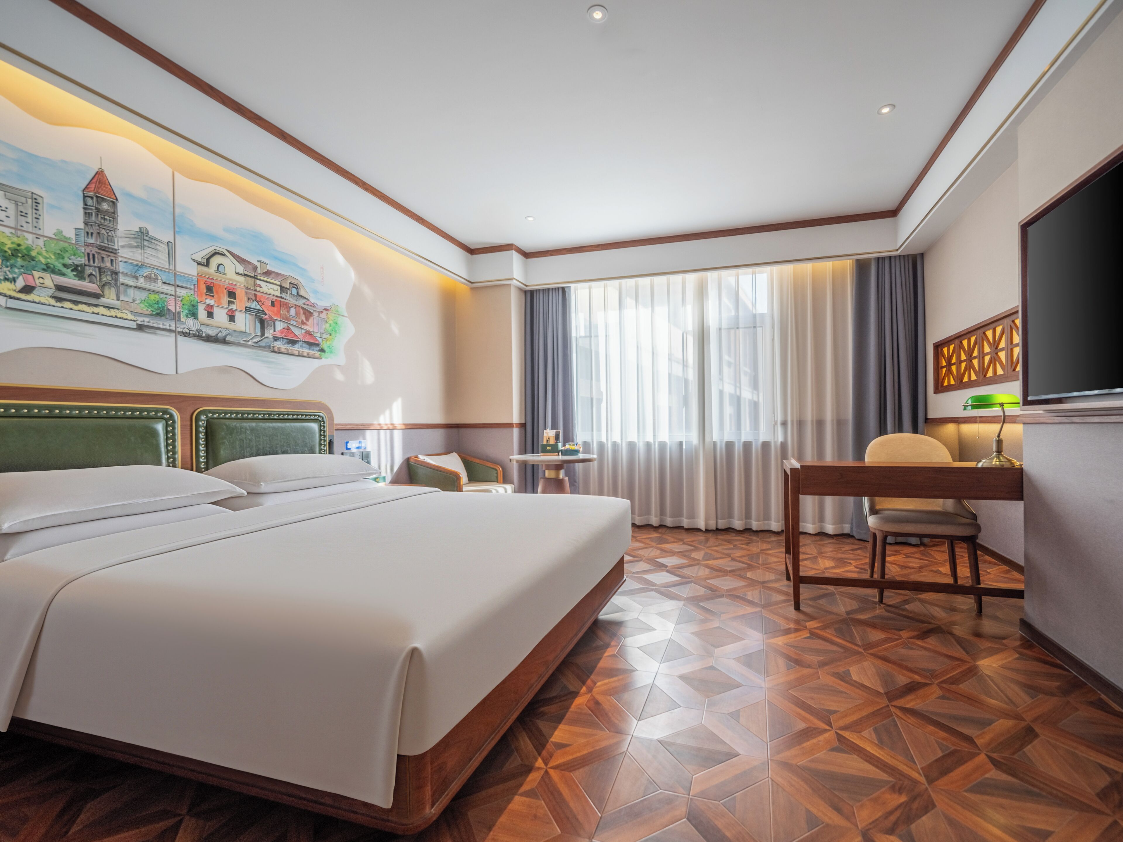 Habitación ejecutiva doble | Minibar con artículos gratuitos, decoración individual, escritorio