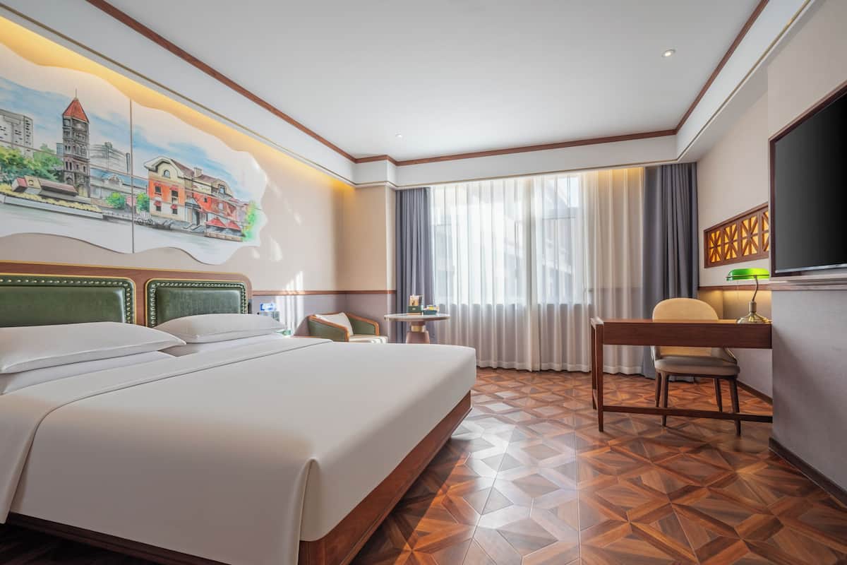 Executive Double Room | Free minibar, individually decorated, desk, laptop workspace