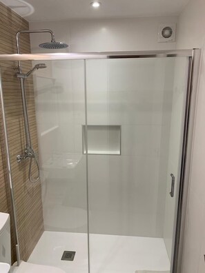 Shower, towels, soap, shampoo