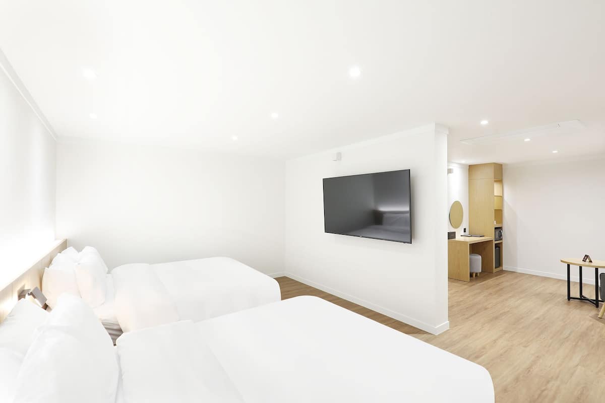 Chambre Familiale avec lits jumeaux | 1 chambre, bureau, Wi-Fi gratuit