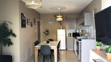 Fridge, stovetop, cookware/dishes/utensils