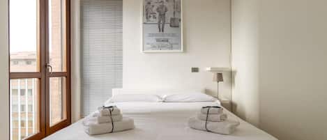 1 slaapkamer, een strijkplank/strijkijzer, wifi, beddengoed