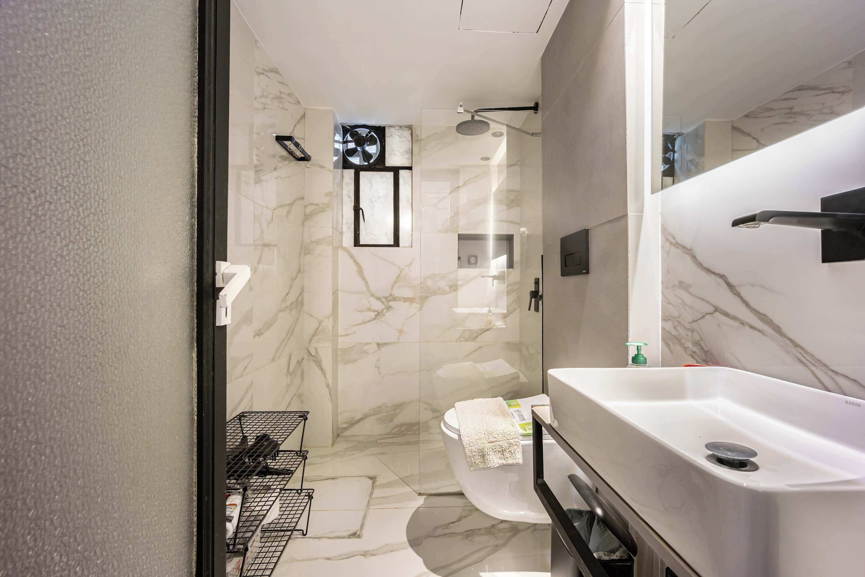 Shower, hair dryer, towels, shampoo