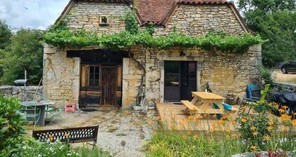 Large traditional stone house in peaceful countryside