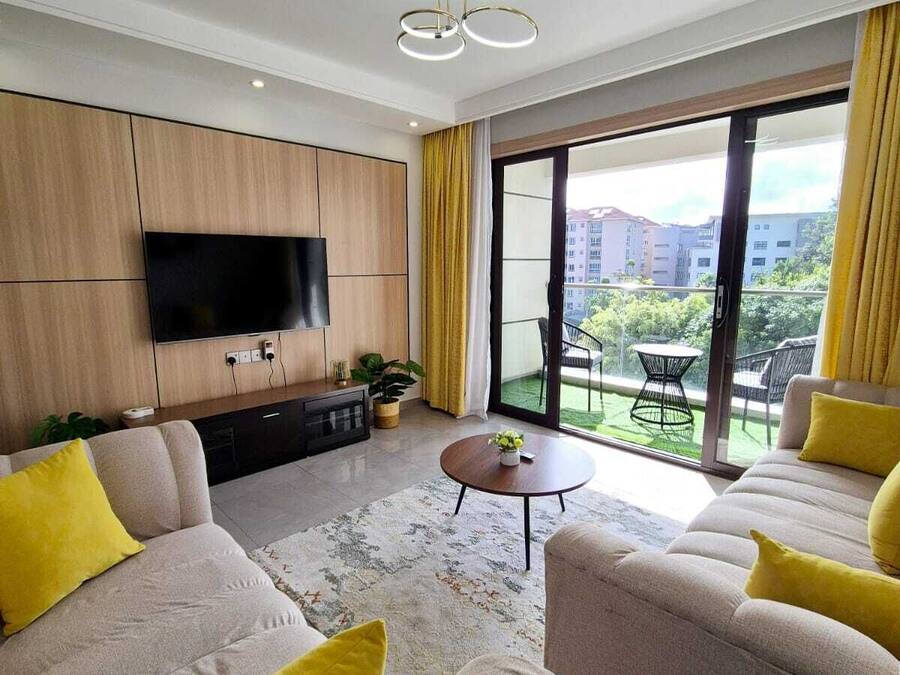 Executive Apartment, Balcony, City View | Living area | 32-inch Smart TV with digital channels