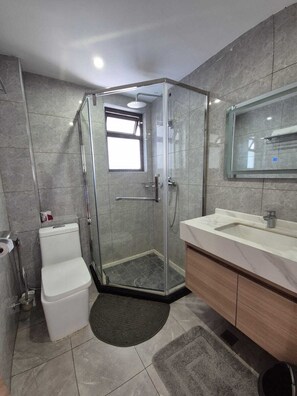 Executive Apartment, Balcony, City View | Bathroom | Shower, free toiletries, slippers, towels - Lux suites 108 Riverside Apartments (Nairobi)