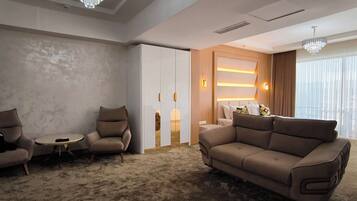 Luxury Suite, Balcony, Park View | 1 bedroom, desk, laptop workspace, free WiFi