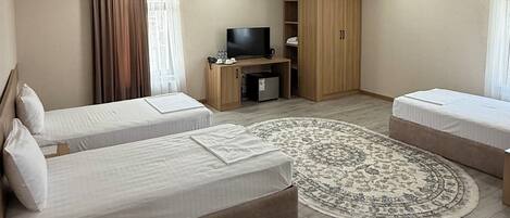 Standard Triple Room, Balcony, City View | Desk, laptop workspace, free WiFi, bed sheets