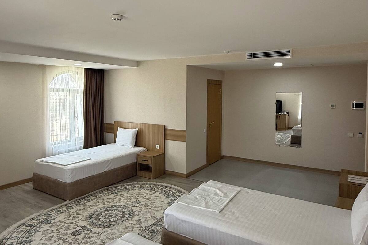 Standard Triple Room, Balcony, City View | 1 bedroom, desk, laptop workspace, free WiFi
