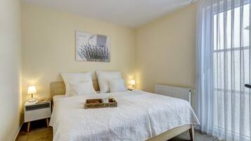 2 habitaciones, wifi gratis y ropa de cama