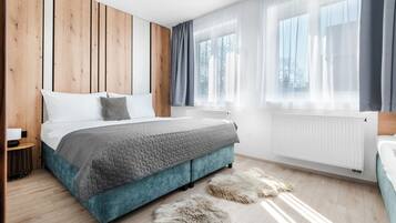 Family Apartment, City View | 1 bedroom, blackout curtains, iron/ironing board, free WiFi