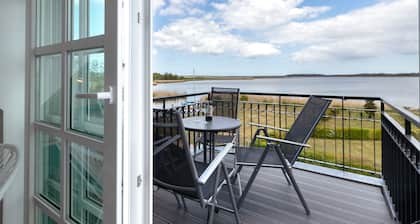 Residenz am Balmer See Whg. 65 with lake view, sauna & wellness by the water