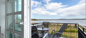 Residenz am Balmer See Whg. 65 with lake view, sauna & wellness by the water