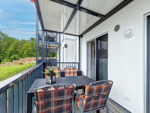 Outdoor dining - Vacation apartment 0549 in the Bernsteinquartier (Kölpinsee)