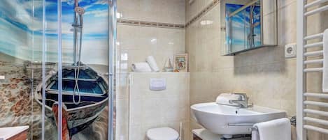 Shower, hair dryer, towels