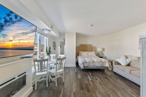 Beachfront Boardwalk 1BR w/ Pool and Parking