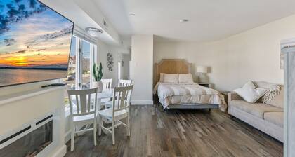 Beachfront Boardwalk 1BR w/ Pool and Parking