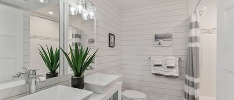 Hair dryer, towels, soap, shampoo