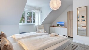 2 室のベッドルーム、WiFi (無料)、ベッドシーツ