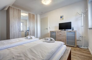 2 habitaciones, wifi gratis y ropa de cama