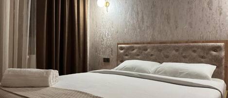 1 غرفة نوم وملاءات أسرّة