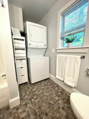 Hair dryer, towels, soap, shampoo