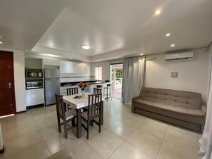 Family Penthouse, 2 Bedrooms, Beachside | Laptop workspace, bed sheets - Parada Beach Apartamentos (Florianopolis)