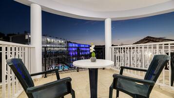 Economy Triple Room, Pool View | Terrace/patio