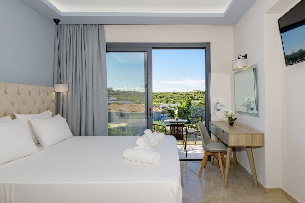 Triple Room, Courtyard View | 2 bedrooms, free WiFi, bed sheets