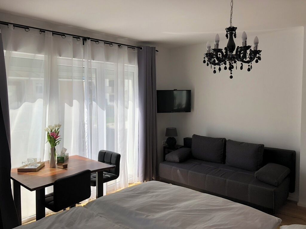 Family Triple Room, Garden View | Bathroom | Shower, hair dryer, towels, shampoo