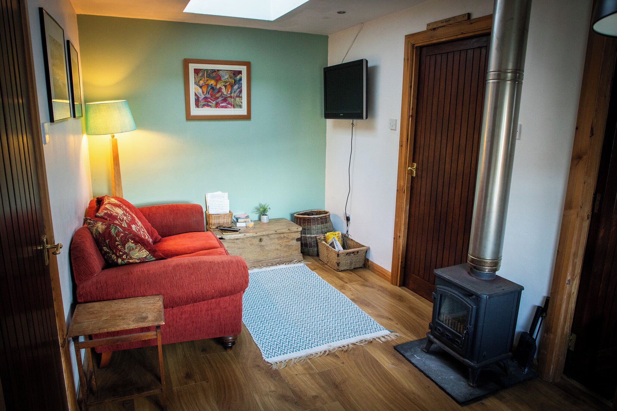 TV, fireplace, books