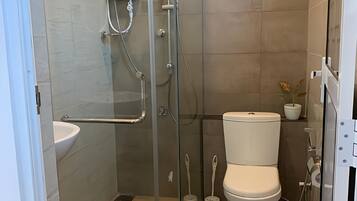 Shower, towels, soap, shampoo