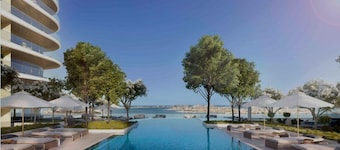 Grand Marina Bleu I Private Beach & Views I PS5 I Infinity Pool I by Skyline Serenity