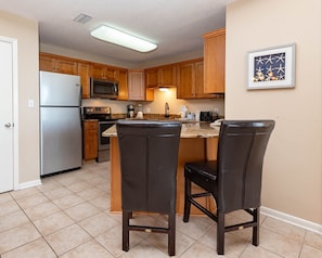 Condo, 3 Bedrooms | Private kitchen | Fridge, oven, coffee/tea maker