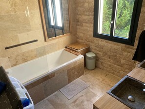 Shower, hair dryer, towels, toilet paper
