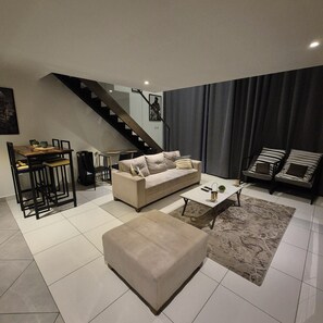 Appartement Duplex, vue jardin | Coin séjour