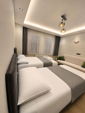 Deluxe Quadruple Room, Garden View | Free WiFi - Uzungol Dear Otel (Caykara)