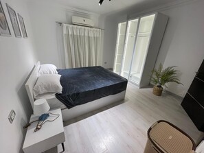 2 dormitorios, tabla de planchar con plancha, wifi y ropa de cama