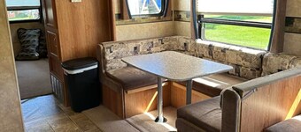 Cozy 2-bedroom RV in charming Apple River with AC