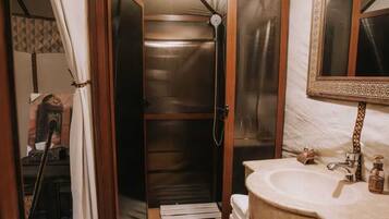 Shower, towels, soap, shampoo